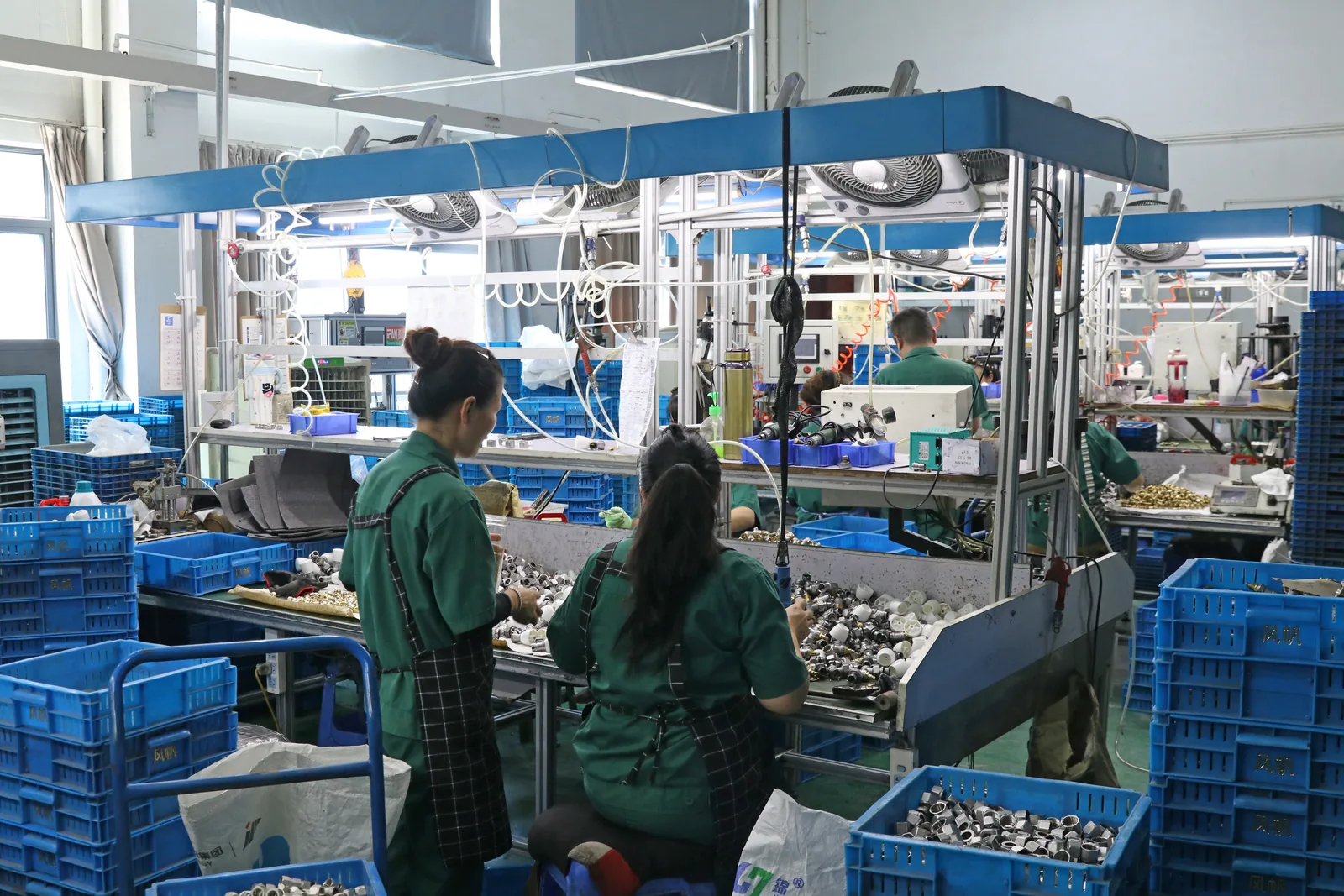 Workers on the Bekaatherm factory floor